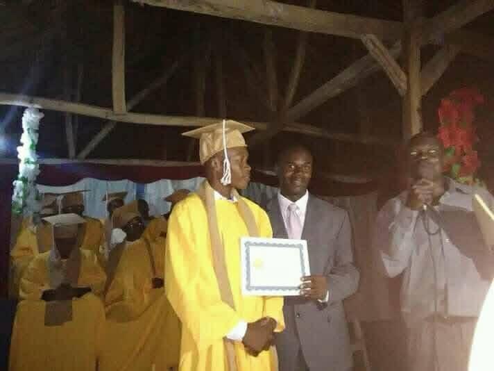 Graduate receiving a diploma